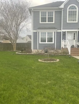 Residential home with green lawn