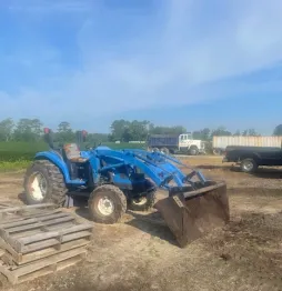 Professional landscaping tractor at work